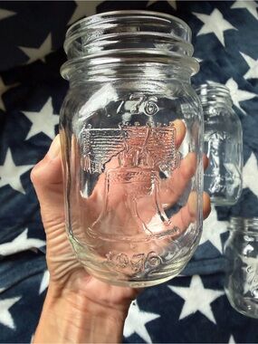 Four Vintage Liberty Bell Embossed Clear Glass Mason Jar